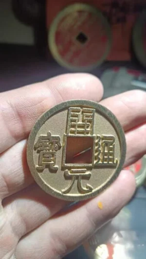 Front and back shot of handmade brass Kaiyuan Tongbao replica coin, vintage brass coin for hand play, home decor, car pendant, garment accessory and DIY craft